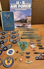 Listing image for Vintage U.S. Air Force Memorabilia Lot 1950 Airman’s Handbook Patches